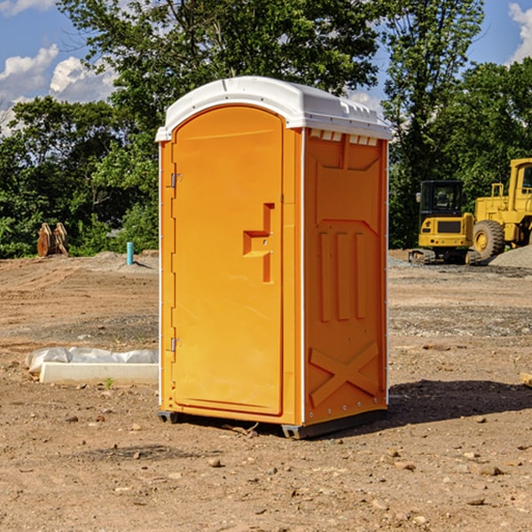 how often are the portable restrooms cleaned and serviced during a rental period in Carbon IA